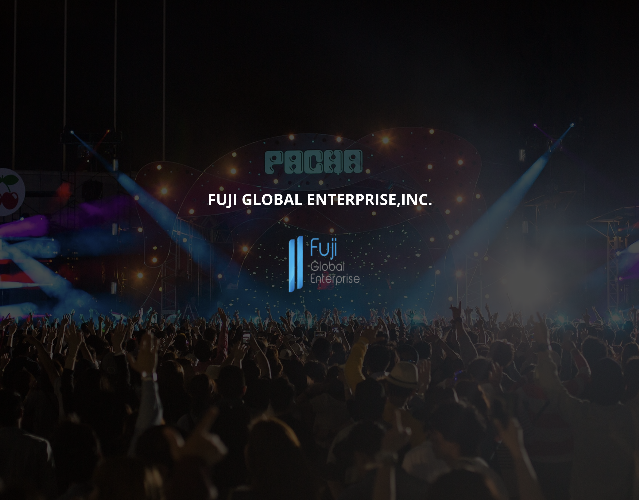 Fuji Global Enterprise, Inc. A night festival stage with colorful lights and a large crowd.